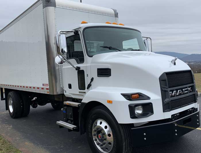 A white 6-class truck.