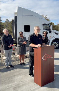 Brad Barber speaking at a podium