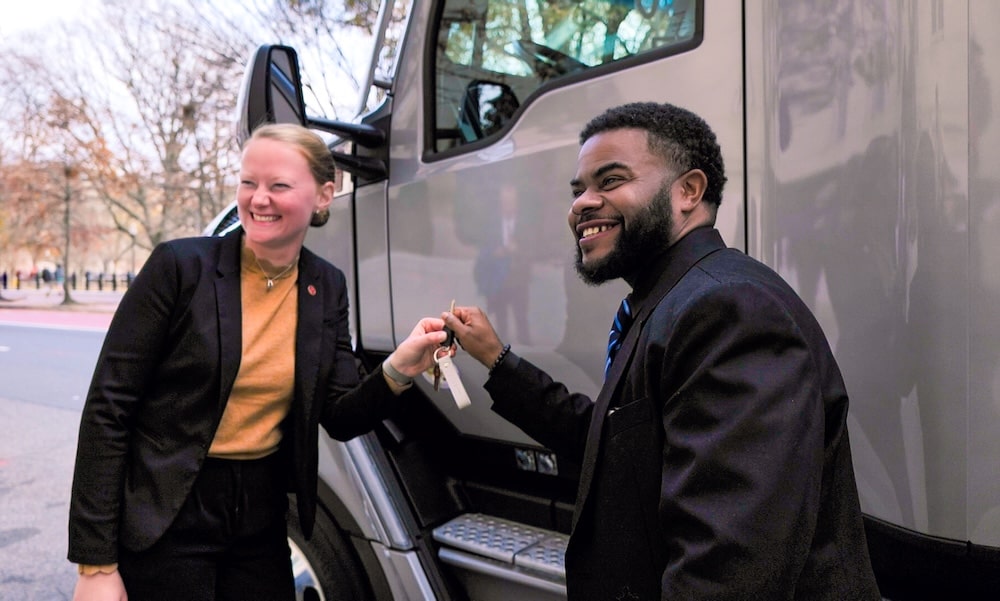 Charles receiving keys to Kenworth truck